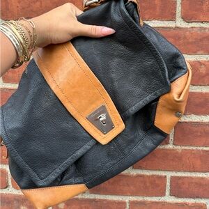 Vintage Kenneth Cole leather black and cognac satchel bag with silver hardware